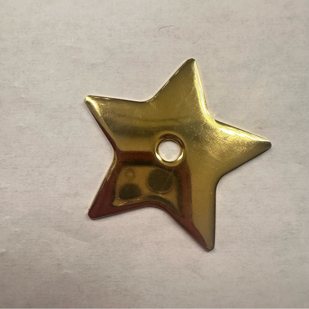 Dior Gold tone star pendant.  Authentic and new.